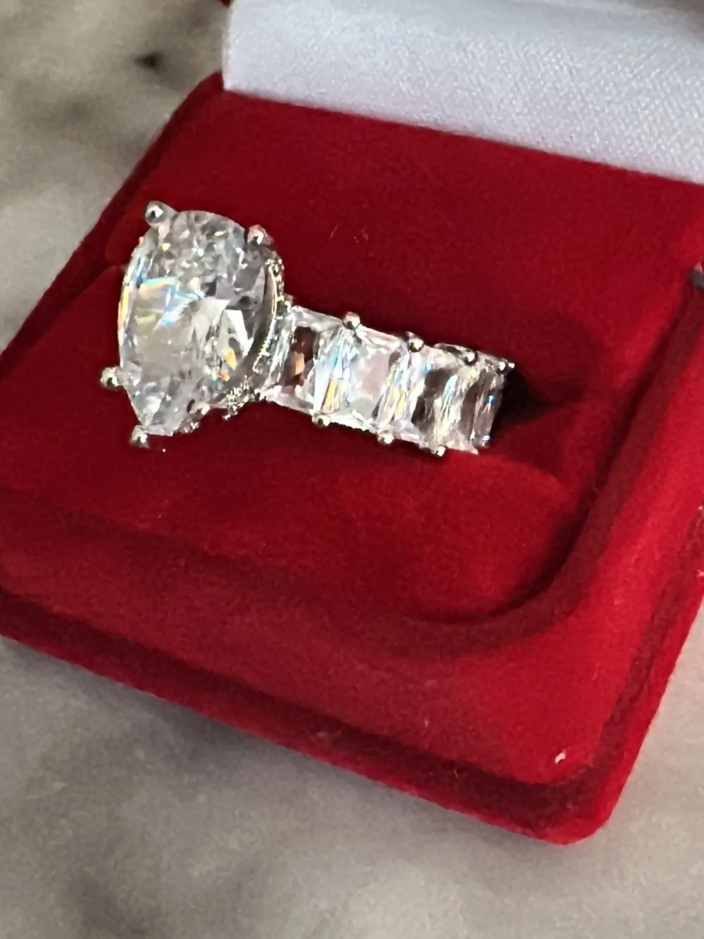 Elegant Pear-Cut Clear Crystal Eternity Ring - Silver Tone